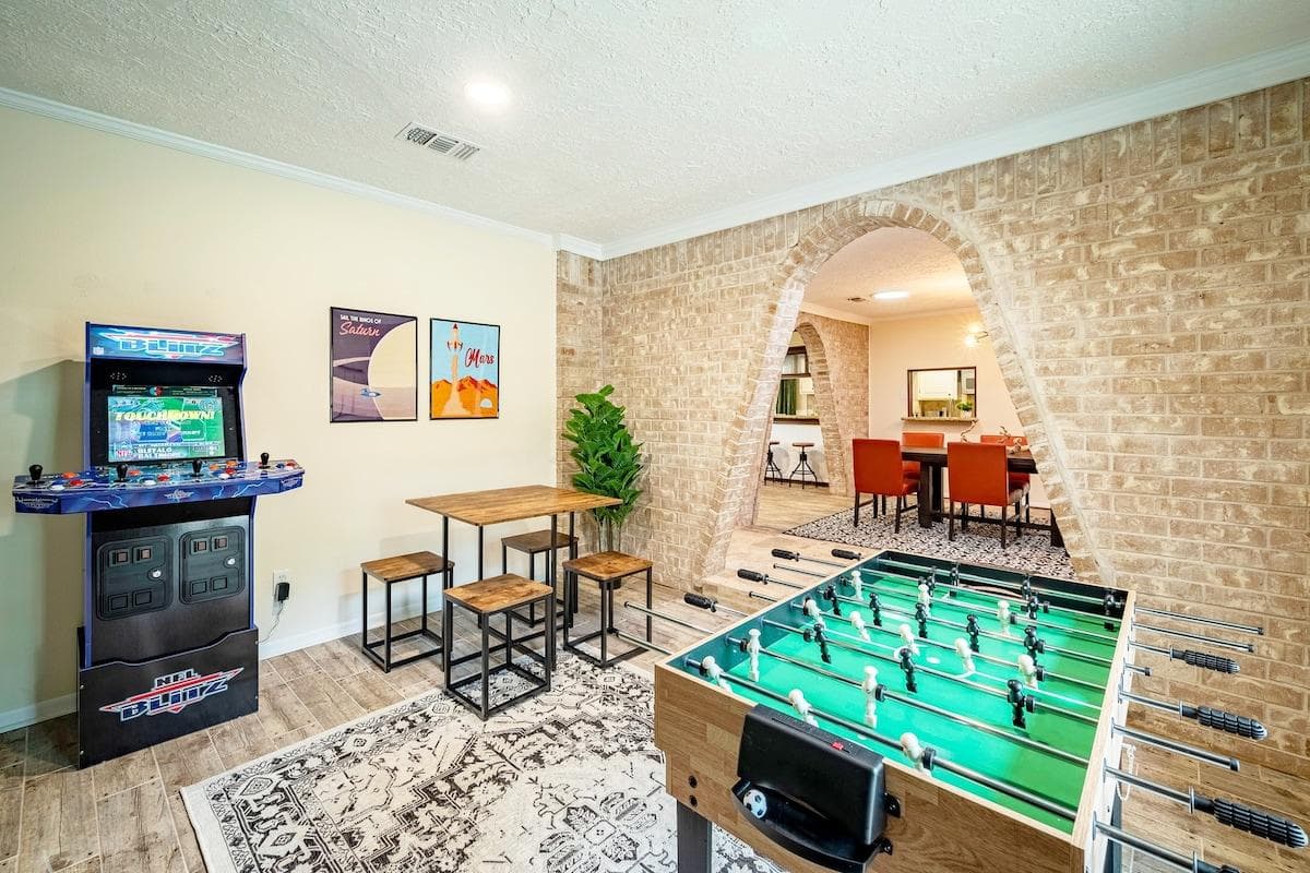 Gaming Haven: Experience Nonstop Thrills with an Arcade Room, Soccer Table and Billiard