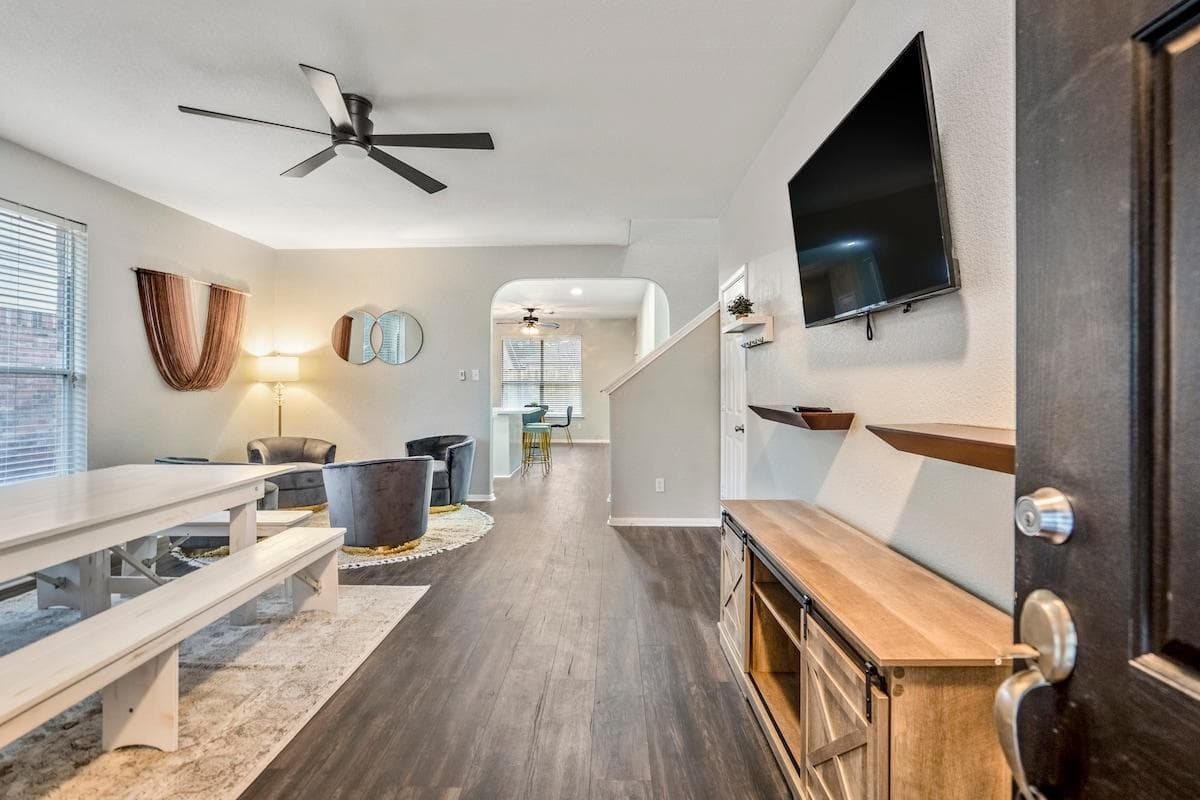 Welcome to our inviting living room, a cozy space where you can relax and enjoy quality time with your loved ones.